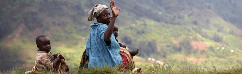 elderly woman making a peace sign sitting by a dir 2024 07 08 21 19 31 utc
