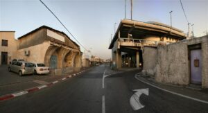 Broken well house and the Tel Aviv Central Bus Station